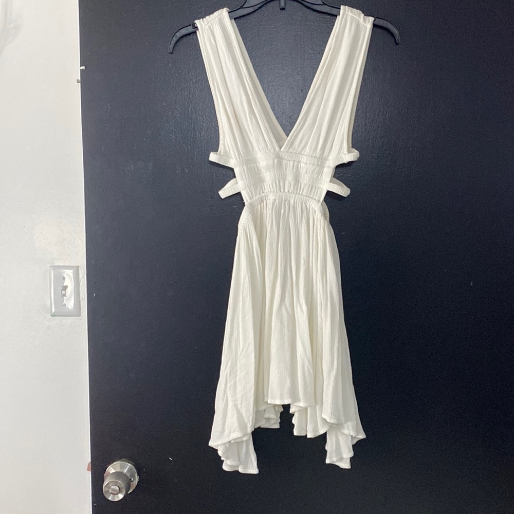 White sundress with side cutouts